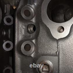 Pair Small Block Chevy 492 Angle Plug Over The Counter Heads. Bare