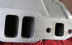 USED SMALL BLOCK CHEVY HURRICANE INTAKE #520301 WithFELPRO 1205 SOLD AS IS